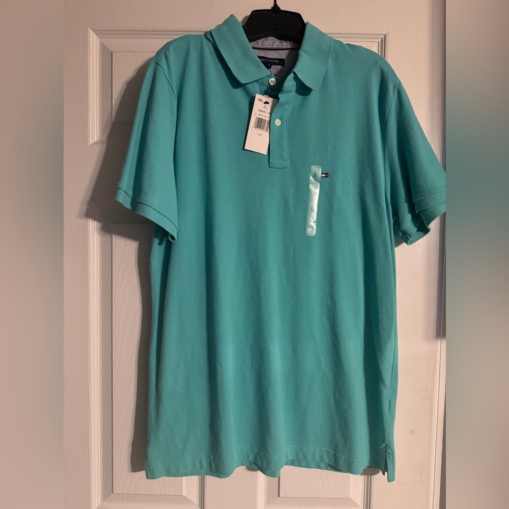 Tommy Hilfiger Polo Shirt size large. Turquoise. Brand new with tags.